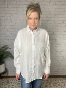 The Relaxed White Button down Shirt
